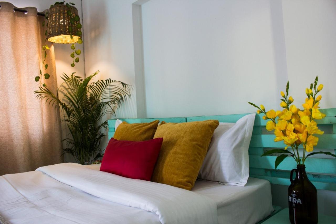 Turquoiise House Hotel Morjim Buitenkant foto