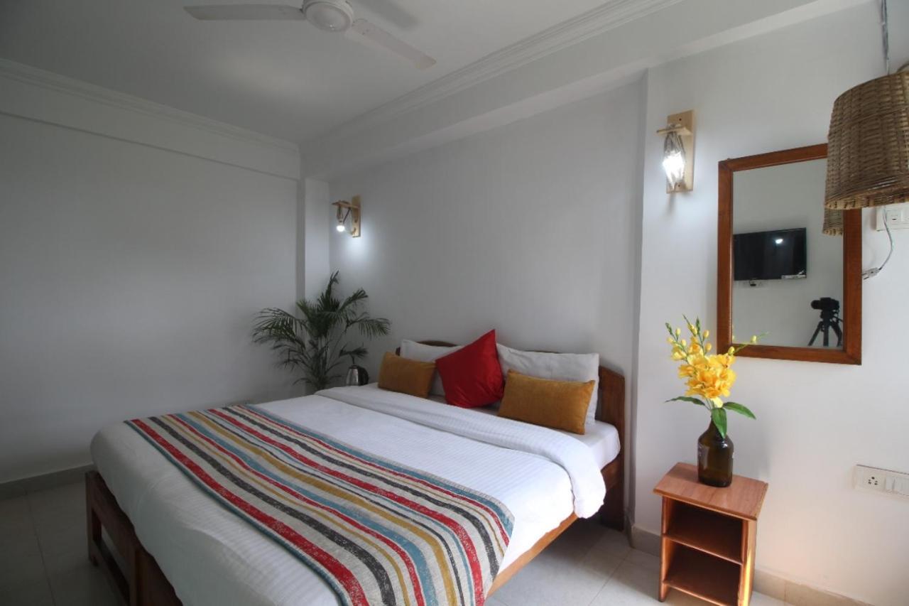 Turquoiise House Hotel Morjim Buitenkant foto